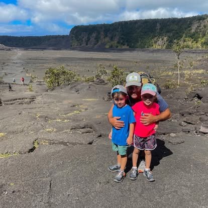 Steve Haumschild hiking Kīlauea Iki crater with his two children